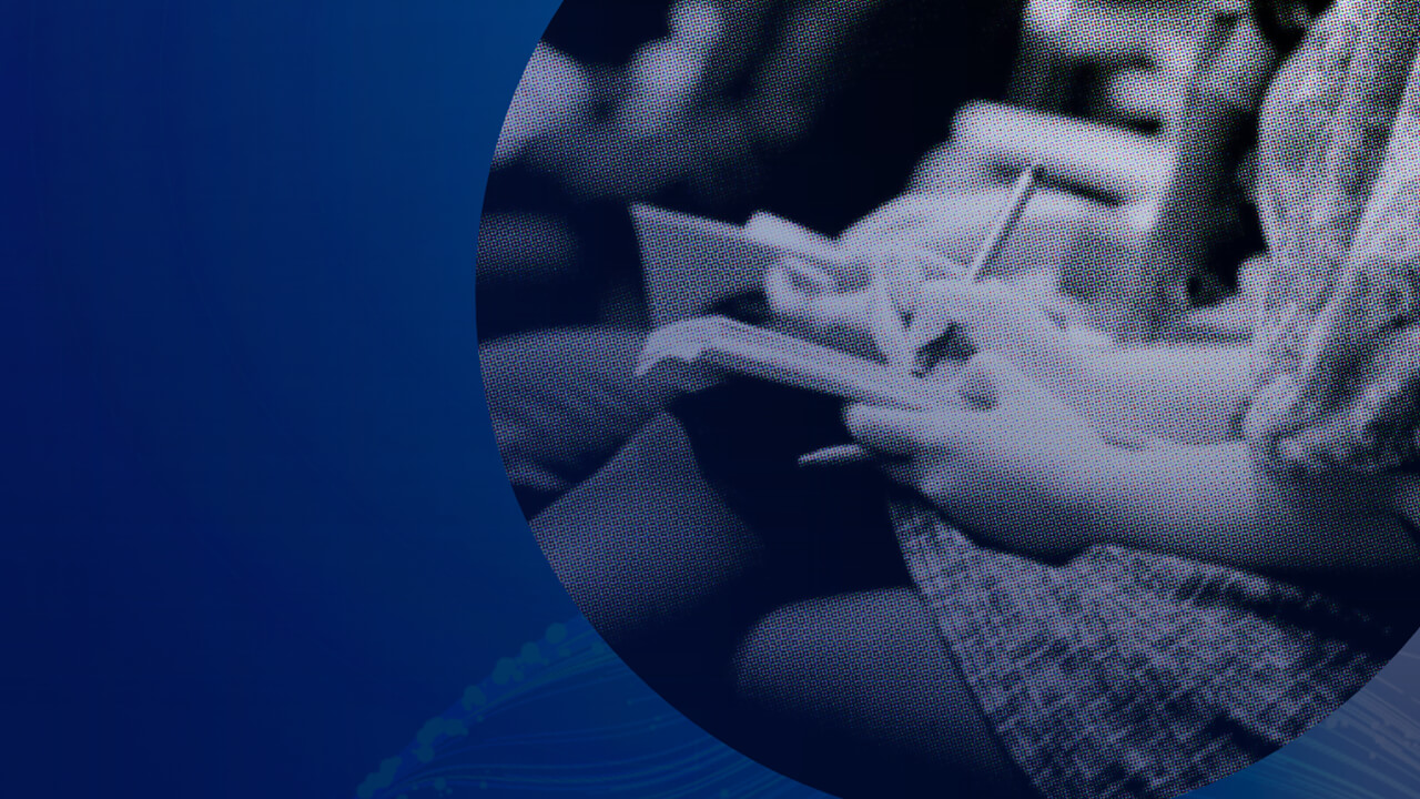 Professionals in seminar taking notes